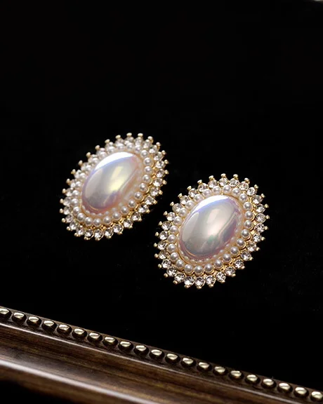 Demure Oval Pearl Earring