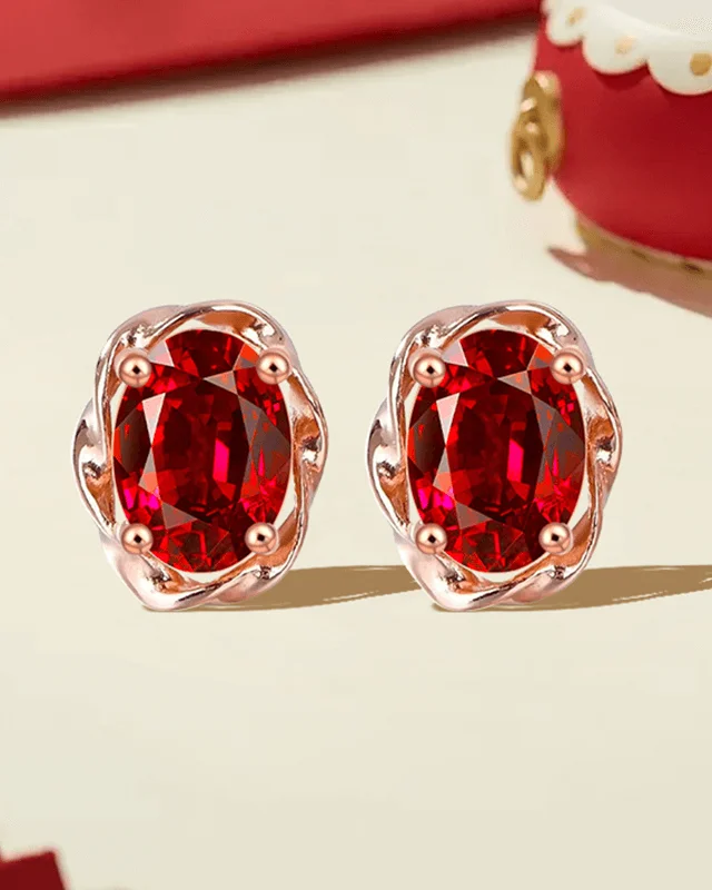 Oval Garnet Stud Flowing Year Design Birthstone Earrings